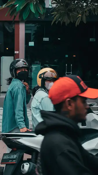 Riders waiting outside a warung