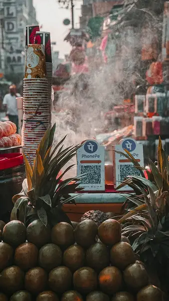 Incense smoke over a fruit stall