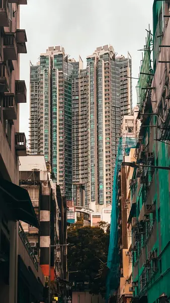 A residential street running between the towers