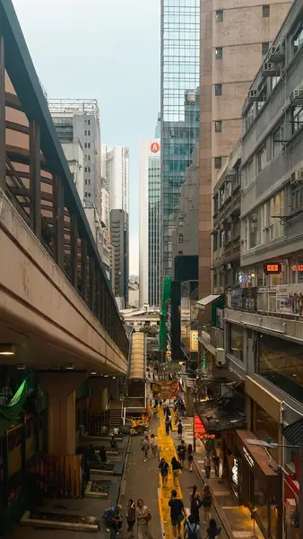 A covered walkway over a busy street