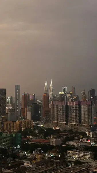 The skyline in haze, Petronas Towers at the far edge