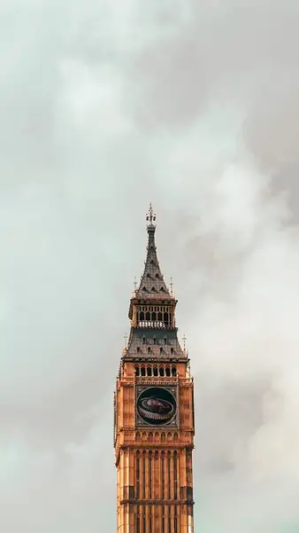 A full-size Big Ben replica against a white sky
